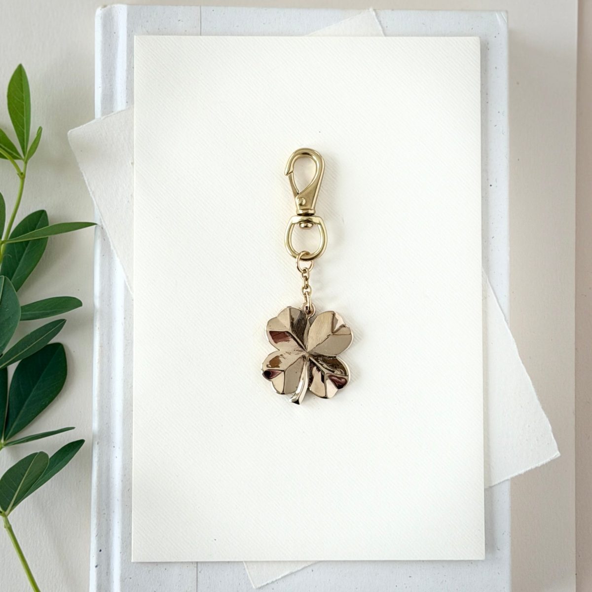 Product Image for BRASS FOUR LEAF CLOVER BAG CHARM